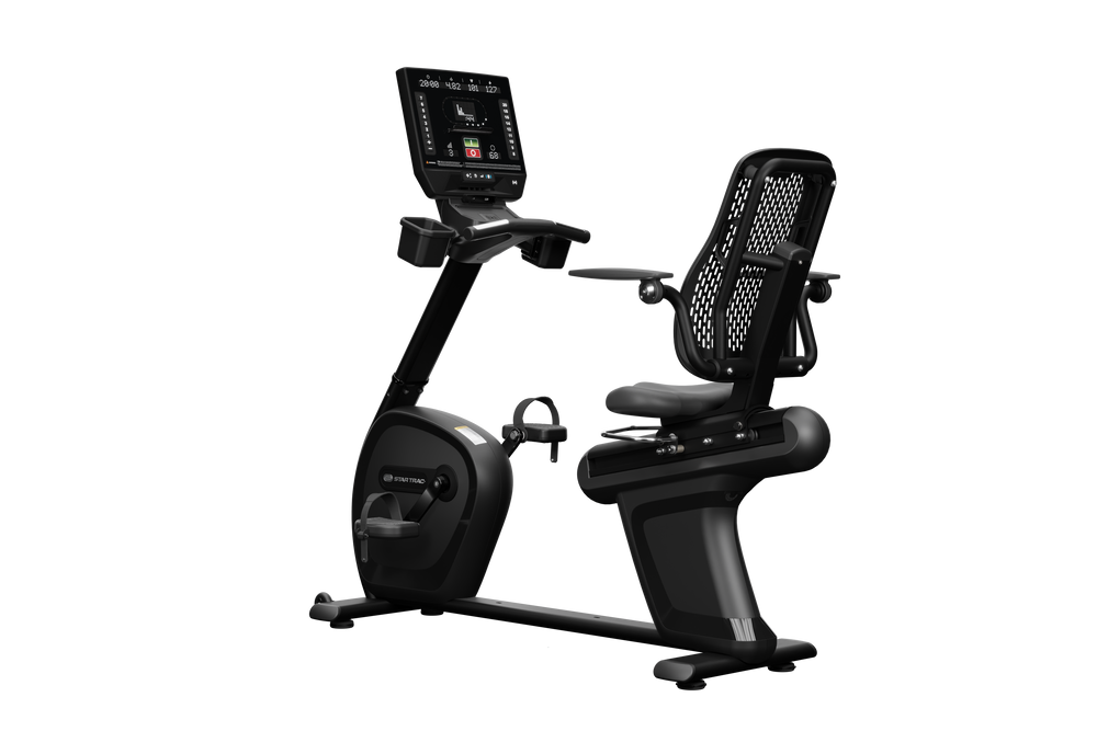 Black exercise bike with digital display on a white background