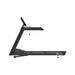Origin Fitness Impulse AC2990 Commercial LED Treadmill hown from the side against a plain white background, with a small red and white Miloguide logo visible on the front frame.