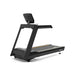 Origin Fitness Impulse AC2990 Commercial LED Treadmill with a digital display screen on the back panel, shown from a three-quarters angle against a plain white background.