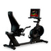 Gym Gear Endurance Touch Commercial Recumbent Bike with a screen on a white background