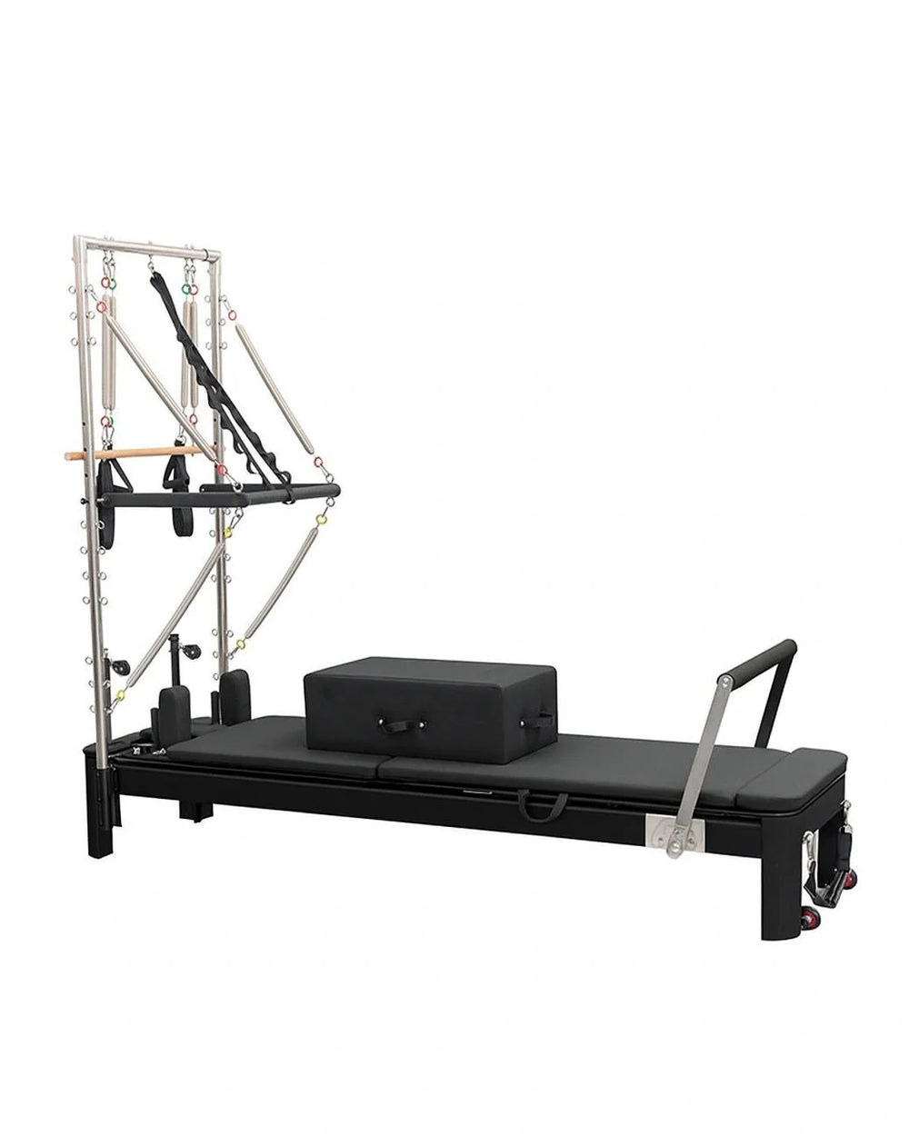 Pilates reformer machine with attachments on a white background
