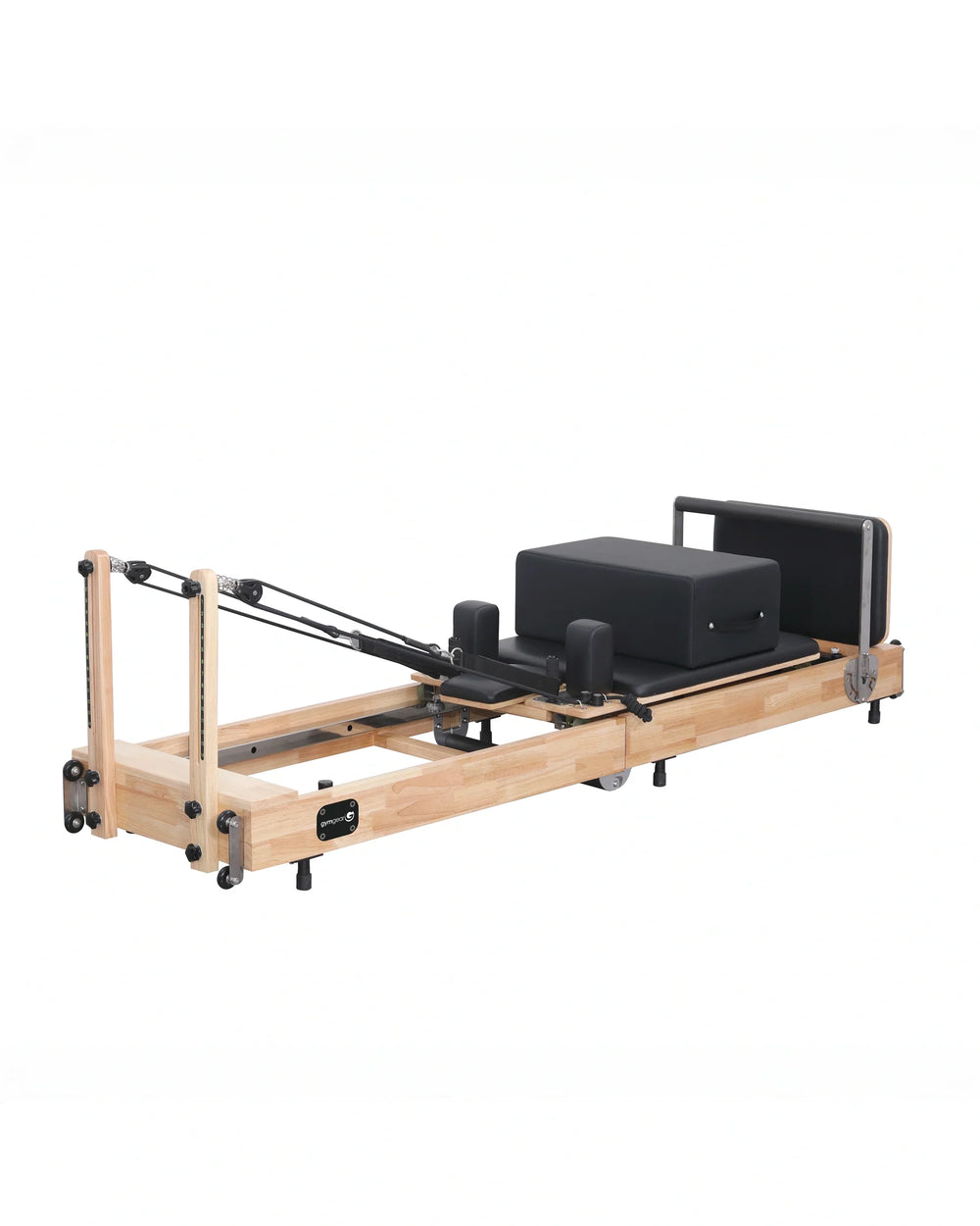 Pilates reformer machine on a white background