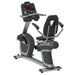 A recumbent exercise bike with a digital console, black padded seat and handlebars, and a silver and gray frame, shown on a plain white background.