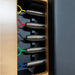 Close-up of components with wires inside a Atro Pilates Portable Folding Reformer