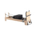 Origin Maple Wooden Studio Pilates Reformer Machine on a white background