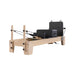 Origin Maple Wooden Studio Pilates Reformer Machine on a white background